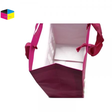 Paper shopping bags with ribbon handle 