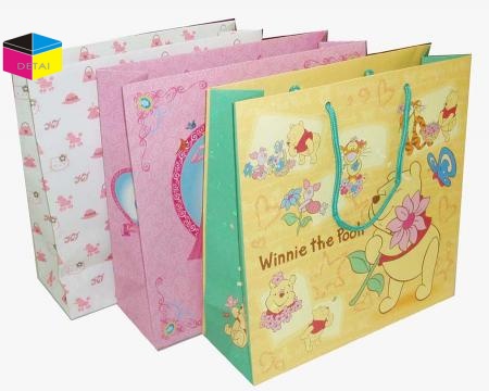 Paper shopping bag with ribbon handle 